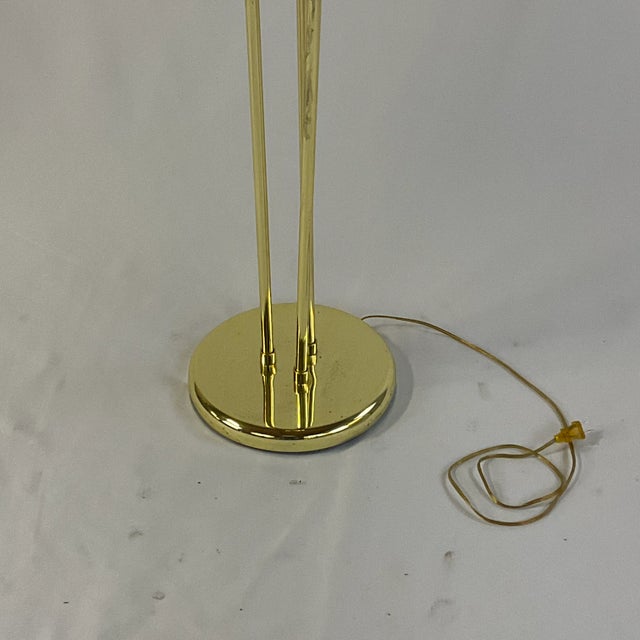 Vintage Home is pleased to offer this 1970s Art Deco style Halogen Torchere Floor Lamp. The brass finish metal lamp is...