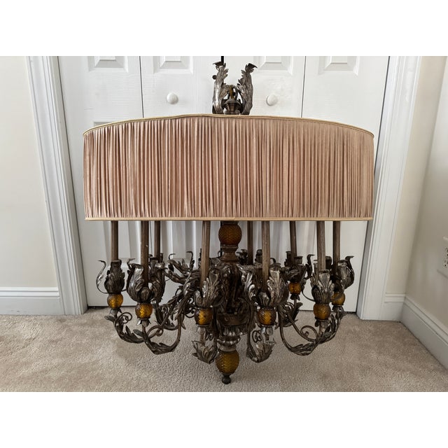 Offering for sale this stunning vintage European chandelier with the following fine features: - Made of wood and iron with...