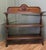 A Large Late Victorian Carved Oak buffet. The buffet has three deep tiers, supported on chunky pierced carved supports,...