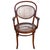 Victorian bent oak & cane number 8256 oak armchair chair by Thonet features an elegant, sculptural frame crafted from...