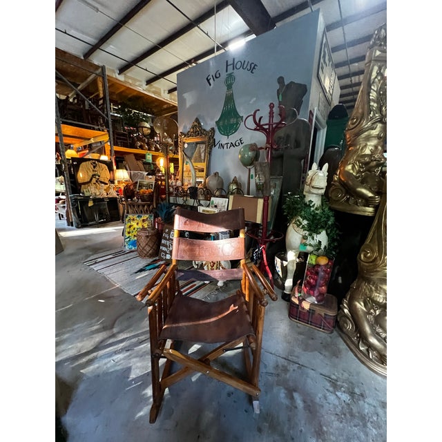 Up for consideration is a beautiful vintage wooden and leather handmade rocking chair with Costa Rica bird designs. This...