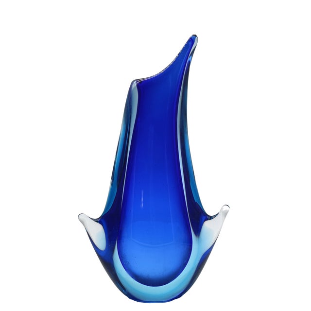 Refined artistic vase in Murano glass in shades of blue and azure made by Flavio Poli for Seguso, 1960s. This vase...