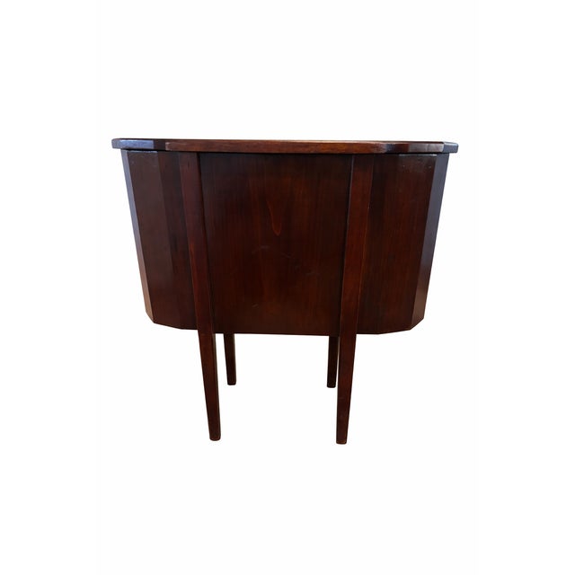 This authentic American antique side cabinet dates to the early 20th century and reflects classic Federal...