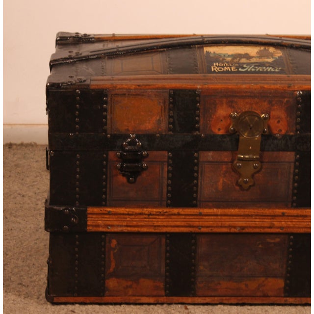 Superb leather-covered wooden travel trunk Corners and edges reinforced with sheet iron and wooden reinforcements on the...