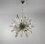 A stunning Venini Murano "Sputnik" chandelier featuring a polished chrome center sphere with radiating triangular cut...