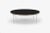 Circular coffee table with granite top and chrome plated base.