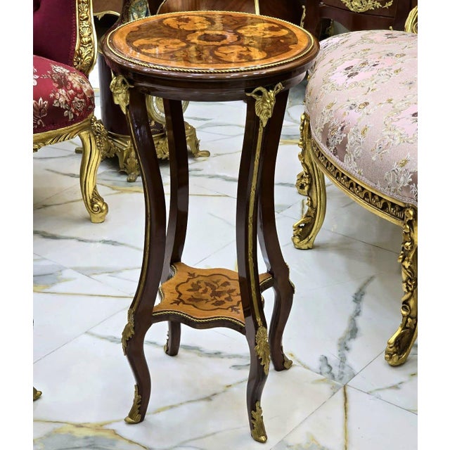 This French Baroque style wood side table is a luxurious statement piece that brings timeless elegance and refined...