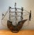 Showcasing dramatic nautical folk artistry and monumental scale, this vintage table lamp is sculpted in the form of a...