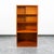 Compact Poul Hundevad compact teak bookshelf with adjustable shelving.