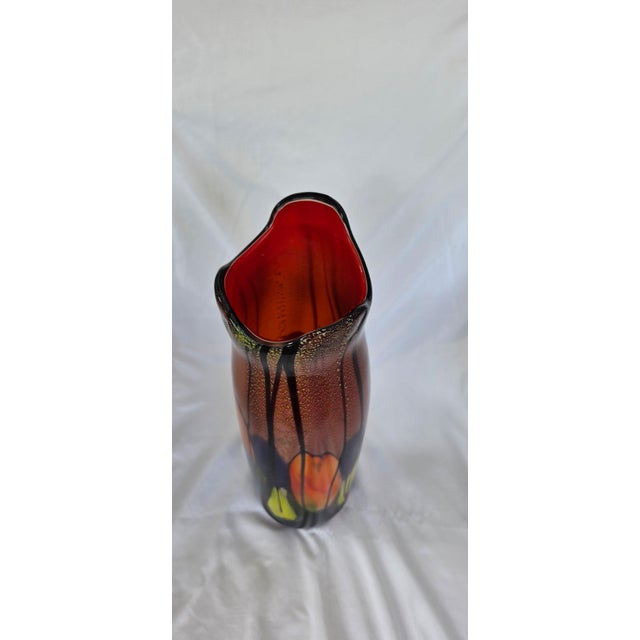 Beautiful multi-colored art glass vase, really heavy. Similar to Murano.