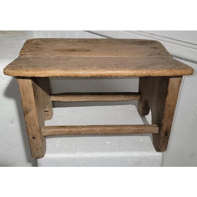 19Thc Pueblo Indian pine hand carved pine child's foot stool or bench.The condition is very good and strong.