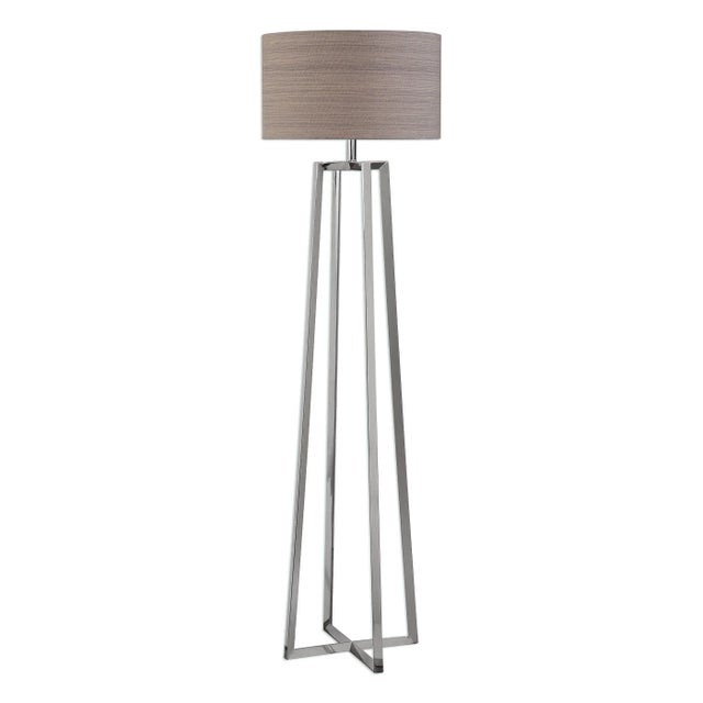 Slightly Tapered In Stature These Triangular Shaped Legs Are Crafted Out Of Polished Stainless Steel. The Round Hardback...