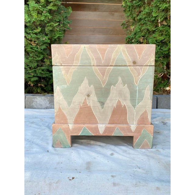 Vintage wood box or small trunk raised on four sculptural tapered legs, hand-painted overall in a bold flame/chevron...