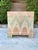 Vintage wood box or small trunk raised on four sculptural tapered legs, hand-painted overall in a bold flame/chevron...