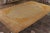 Hand-knotted in Turkey originating between 1870-1880, this antique Oushak rug enjoys a subtle, luminous sheen to its...