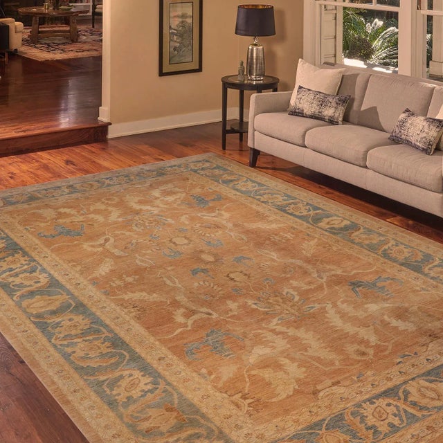 "Enhance the ambiance of your home with this magnificent Persian-influenced Turkish hand-knotted rug made by skilled...