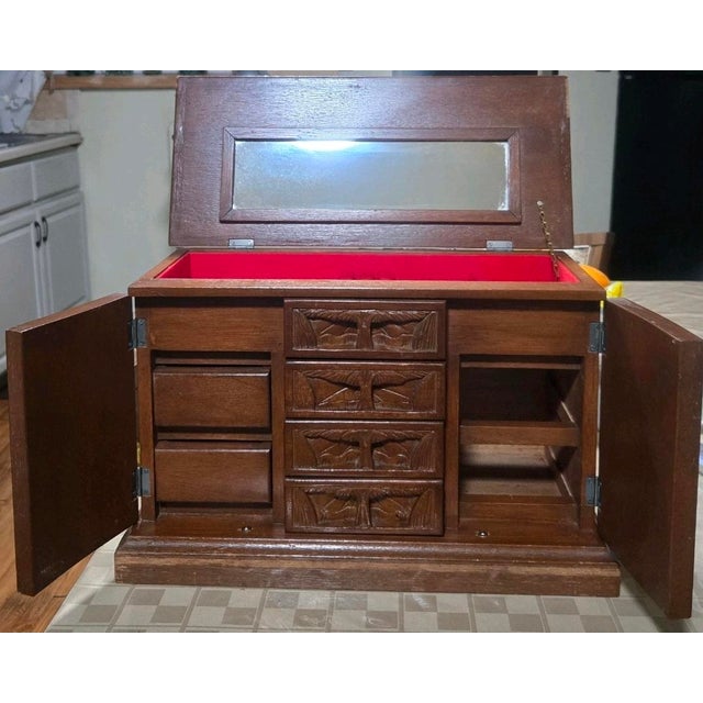 This is pre-owned and in fair condition. There are a fair amount of skuffs and scratches mostly on the top of the jewelry...