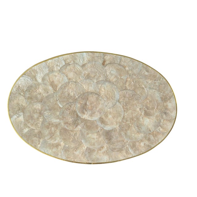 Set of 8 Vintage Natural Capiz Shell Oval Placemats with a Brass Metal Edging and a Cork backing They are in Excellent...