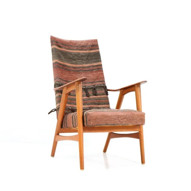 Stunning Mid-Century Modern lounge chair. Striking Dutch design from the 1960s. Solid teak frame with Kilim upholstery....