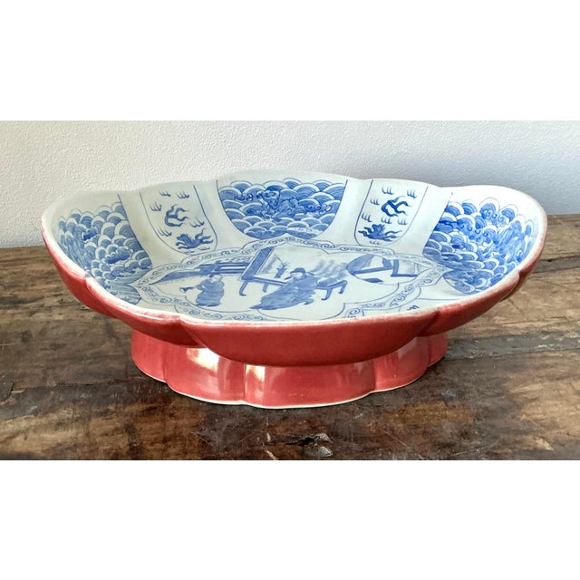 This exquisite pair of vintage Asian pedestal bowls showcases the refined beauty and whimsical charm of Chinoiserie...