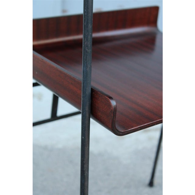 Curved Metal and Mahogany Shelf from Carlo Ratti, 1950s, in Restored conditions. Designed 1950 to 1959 This piece is...