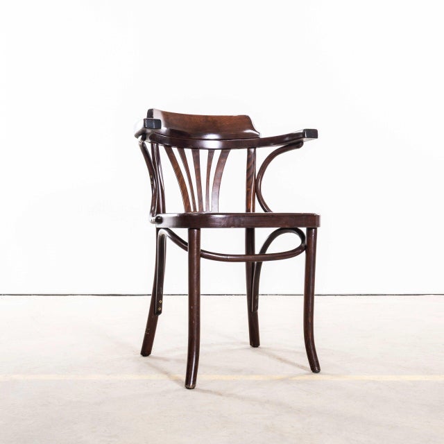 : 1980’s Dark Walnut Fanback Armchair By Sellaton. Good quality classic bentwood armchairs with a typical fan back arm...