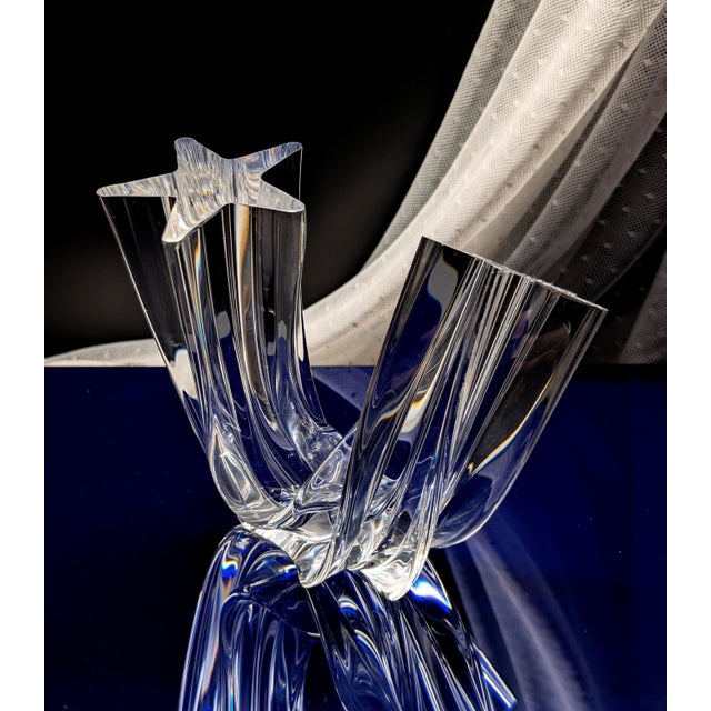 Exquisite crystal sculpture by renowned U. S. maker, Steuben, entitled Star Stream, designed in 1988 by Neil Cohen. From...