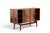 This 1960s Danish sideboard is a study in understated elegance, with a long low silhouette in book-matched rosewood and a...