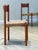 A set of an early and distinguished example of the dining chair, conceived with a high-influence of the ch36 chair by hans...