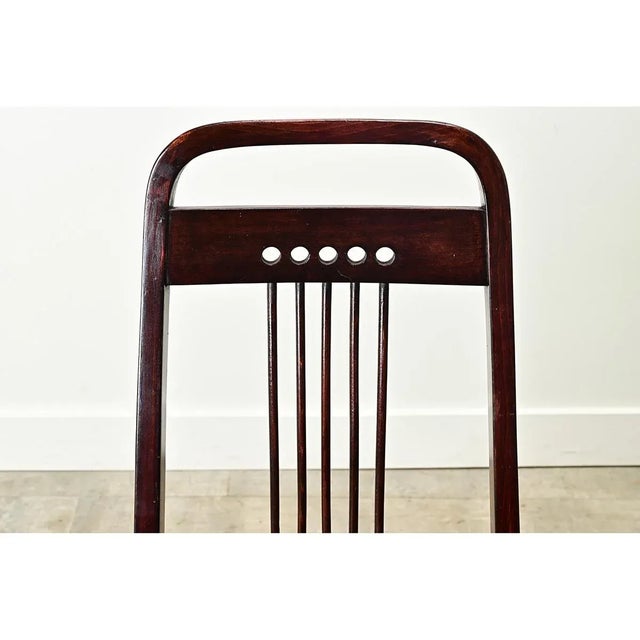 A statement armchair originally designed by Austrian multi-hyphenate Josef Hoffmann circa 1900 and produced by the firm of...