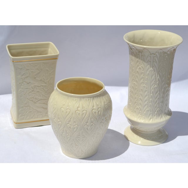 The 9.5 inches tall Lenox Autumn Vase is a collectible porcelain or fine bone china vase featuring hand-decorated autumn-...