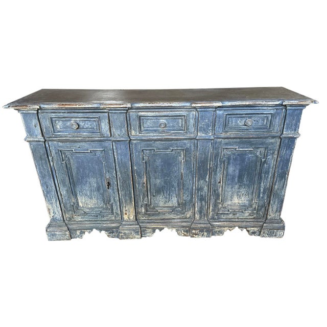 A very handsome late 19th - early 20th century Credenza from Northern Italy. Soundly constructed from painted wood with...