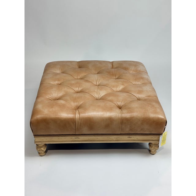 This is a beautifully crafted square leather cocktail ottoman by Hancock & Moore, custom-sized and designed in a classic...