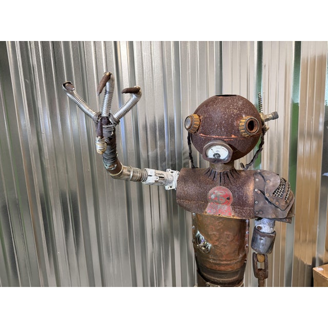 Steampunk. Robot lamp, Dimensions: 146 x 50 x 80 cm. Made with car parts, Vintage, Rust and wear, very heavy I have...