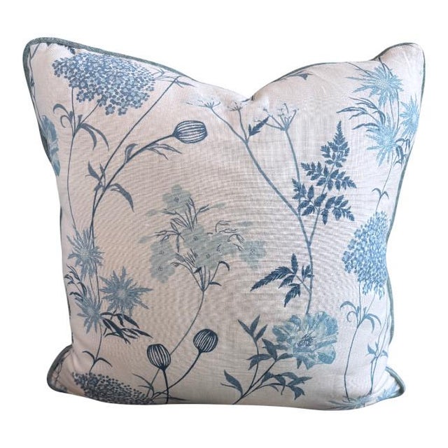 Elevate your décor with this elegant set of two throw pillows featuring a delicate botanical print in soft blue tones. The...