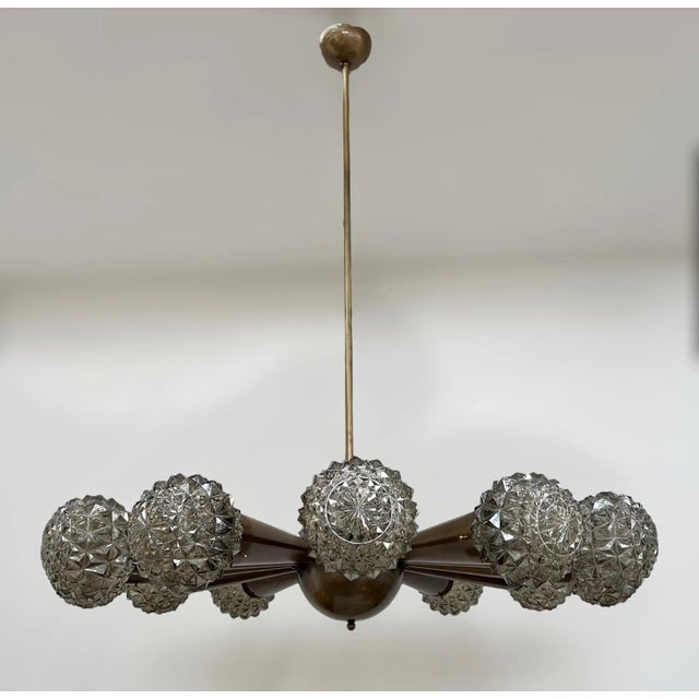 Italian chandelier with smoky faceted Murano glass shades, mounted on bronzed finish frame / Designed by Fabio Bergomi for...