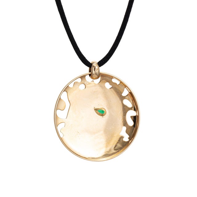 Stylish and finely detailed pre-owned Panthere de Cartier pendant on a black silk cord chain"Pampilles" lariat necklace...