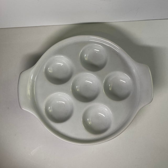 Vintage set of six French porcelain escargot or mushroom baking and serving dishes.