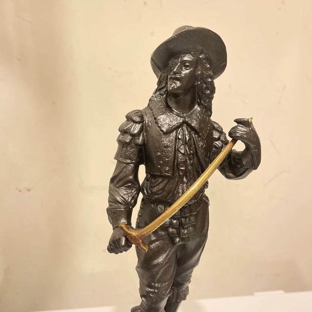 Pair of late 19th century French spelter statue figures of cavaliers, possibly Don Juan and Don Cesar. Antique black Oil...