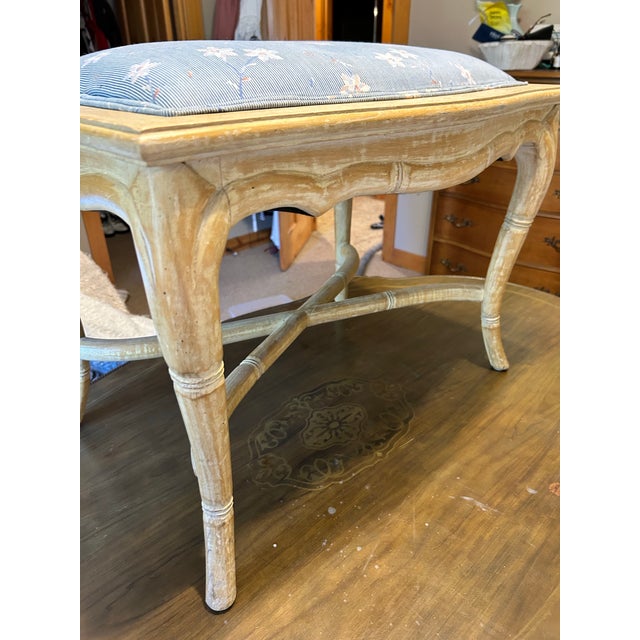 This little stool is super sturdy. It is carved light wood and makes a great footstool or stool for sitting on. It is very...