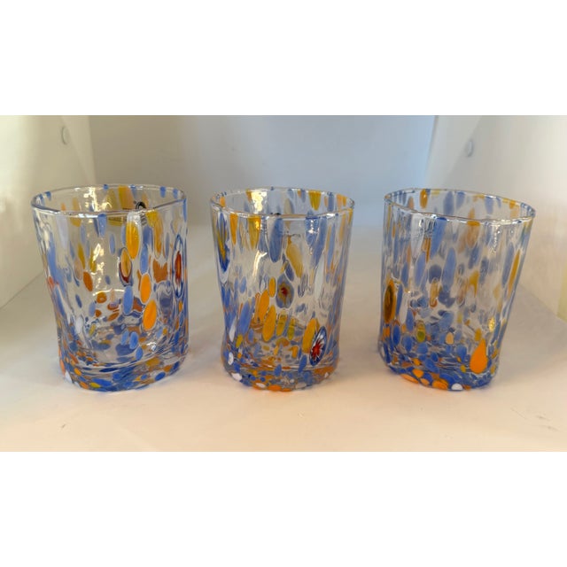Set of 6 Murano glass tumblers designed by Alessandro Coppola. The glasses are hand-blown in Italy and features a...