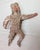 This antique 19th century handmade Mexican terracotta warrior sculpture wearing padded armor is a unique and culturally...