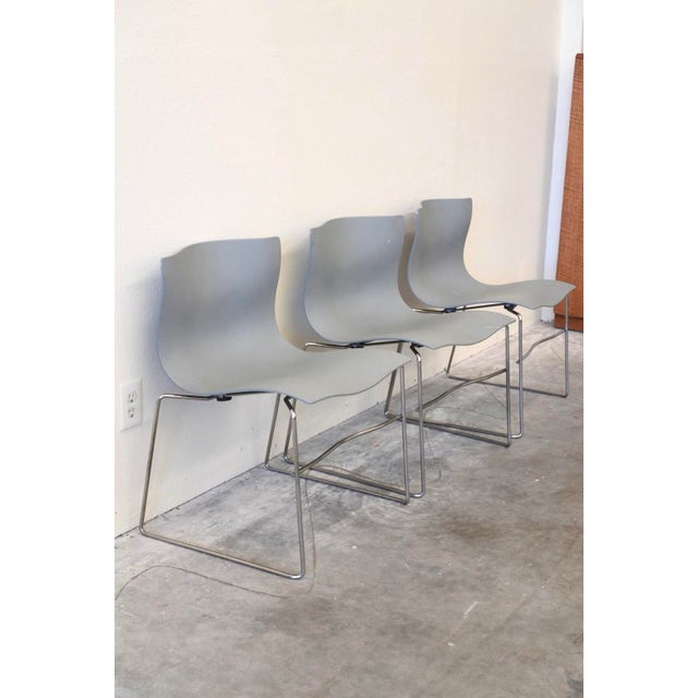 A rare set of 3 vintage Handkerchief Chairs designed by the renowned husband-and-wife team, Lella and Massimo Vignelli,...