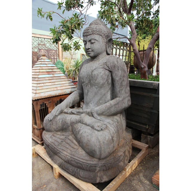 Large impressive carved grey stone sitting Buddha. Vintage piece with beautiful peaceful expression. Resting in crossed...