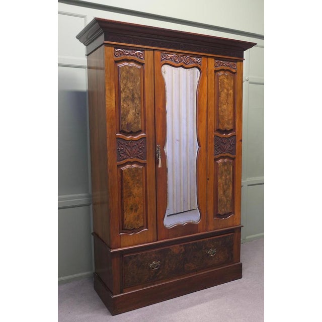 Victorian Carved Arts & Crafts Walnut Wardrobe This is a very unusual piece, the wardrobe is a superb quality, it has...