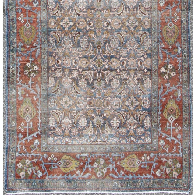 Measures: 4'2 x 13'8. Antique Persian Malayer Gallery Runner with Allover Floral Motifs in Faded Blue. Keivan Woven Arts...
