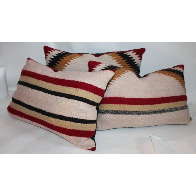 This set of three saddle blanket pillows are all from one saddle blanket.