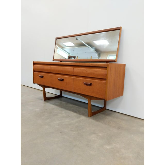 Authentic vintage mid century modern teak dressing table / vanity / chest of drawers / dresser with mirror. By William...