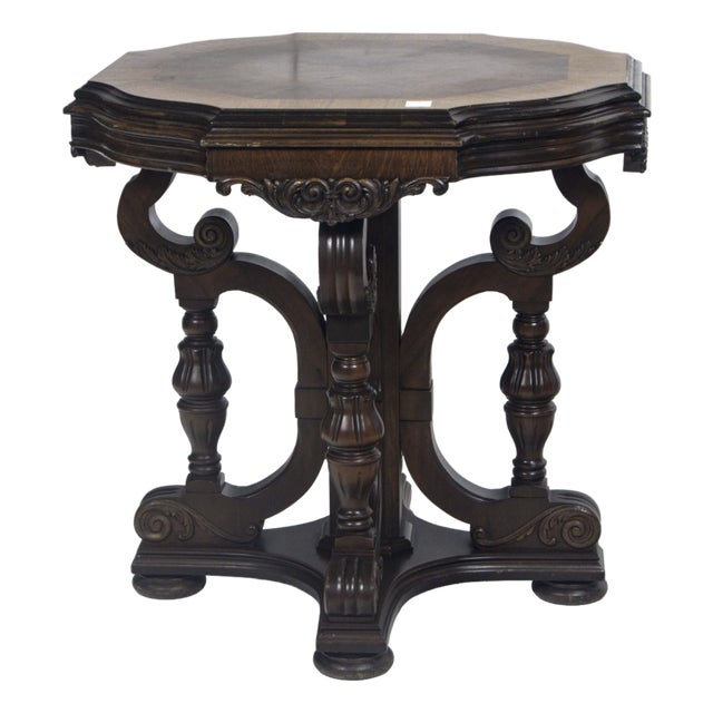 Octagonal Jacobean Revival Carved Oak Center Table – Figural Scroll Base & Bookmatched Veneer Top, C. 1920s For Sale