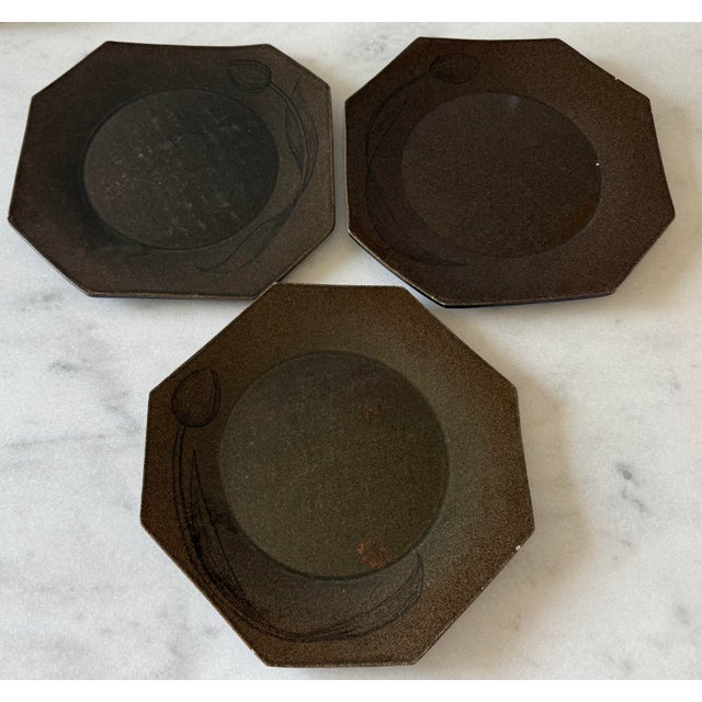 Set of 3 vintage handmade octagonal stoneware serving plates with a muted brown finish and faint presence of a hand-...